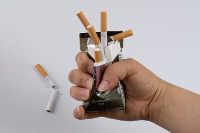Cigarettes Crushed in Hand